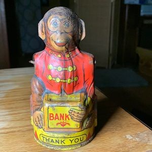 1940 Monkey Bank. Missing arm and hat.